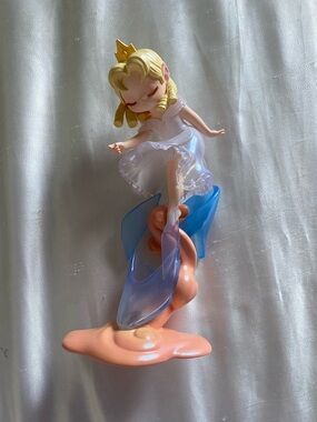 Blonde Princess Figurine with White Dress and Blue Shoes